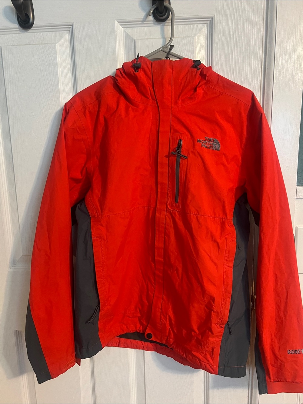 The North Face Black Jacket with Red Logo